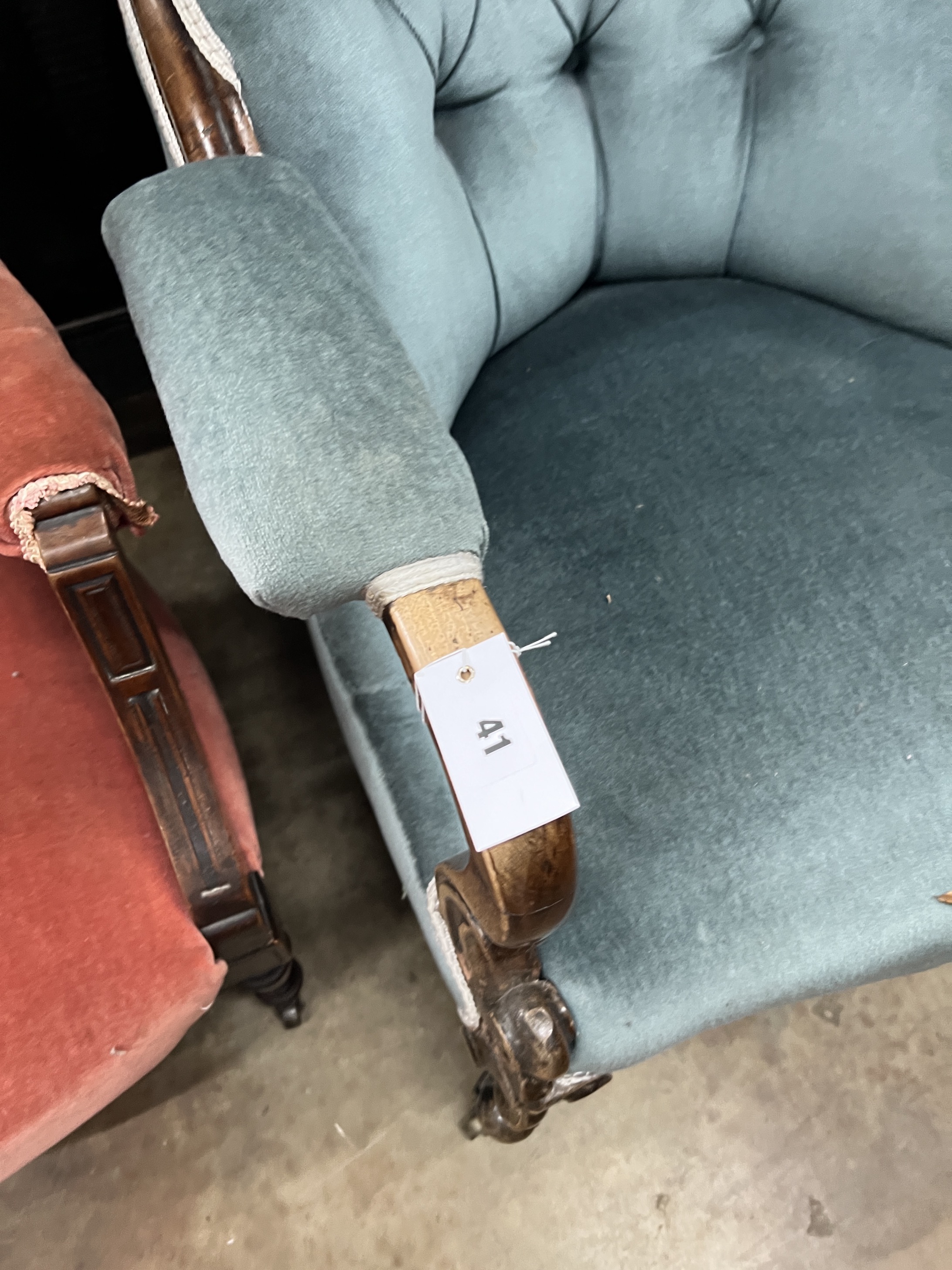 A pair of late Victorian tub shaped open armchairs, upholstered, one in red, the other in blue, width 68cm, depth 58cm, height 72cm